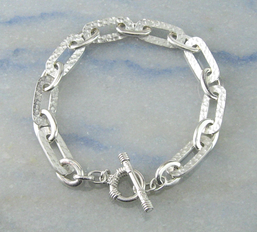 Linked sterling bracelet by Cesars World Inc. | Cesars World Inc